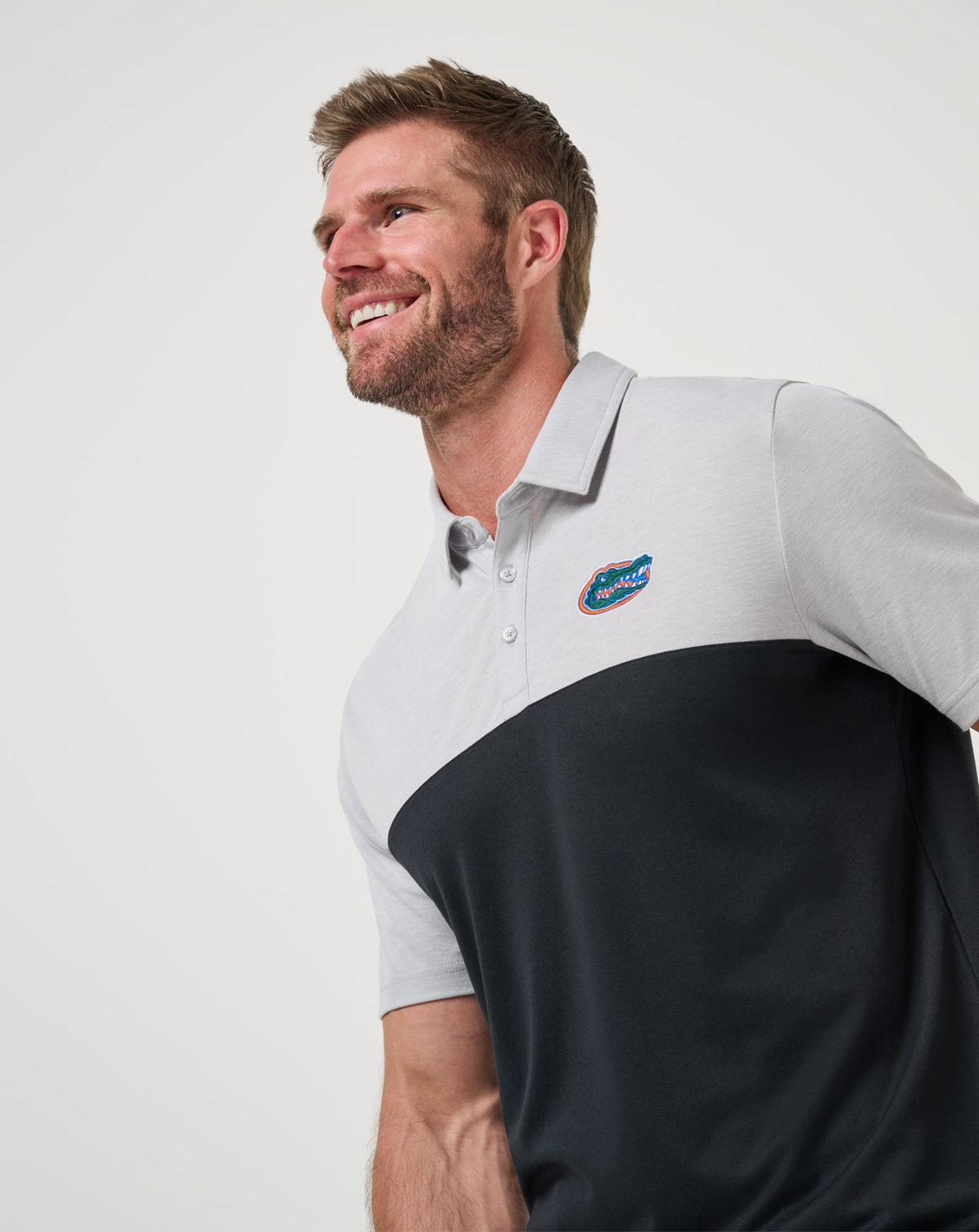 Florida Drop Back Polo Heather Grey/Black | Travis Mathew Featured