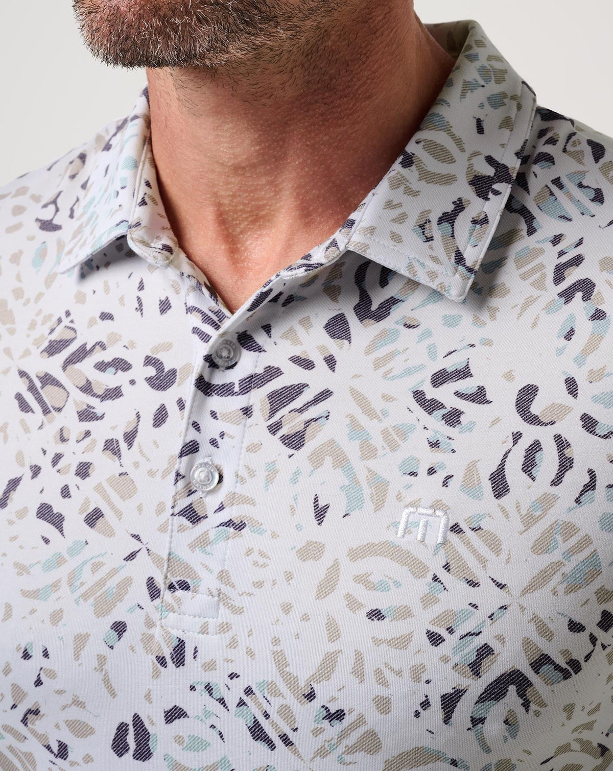 Featherweight Chill Polo White | Travis Mathew Top Pick