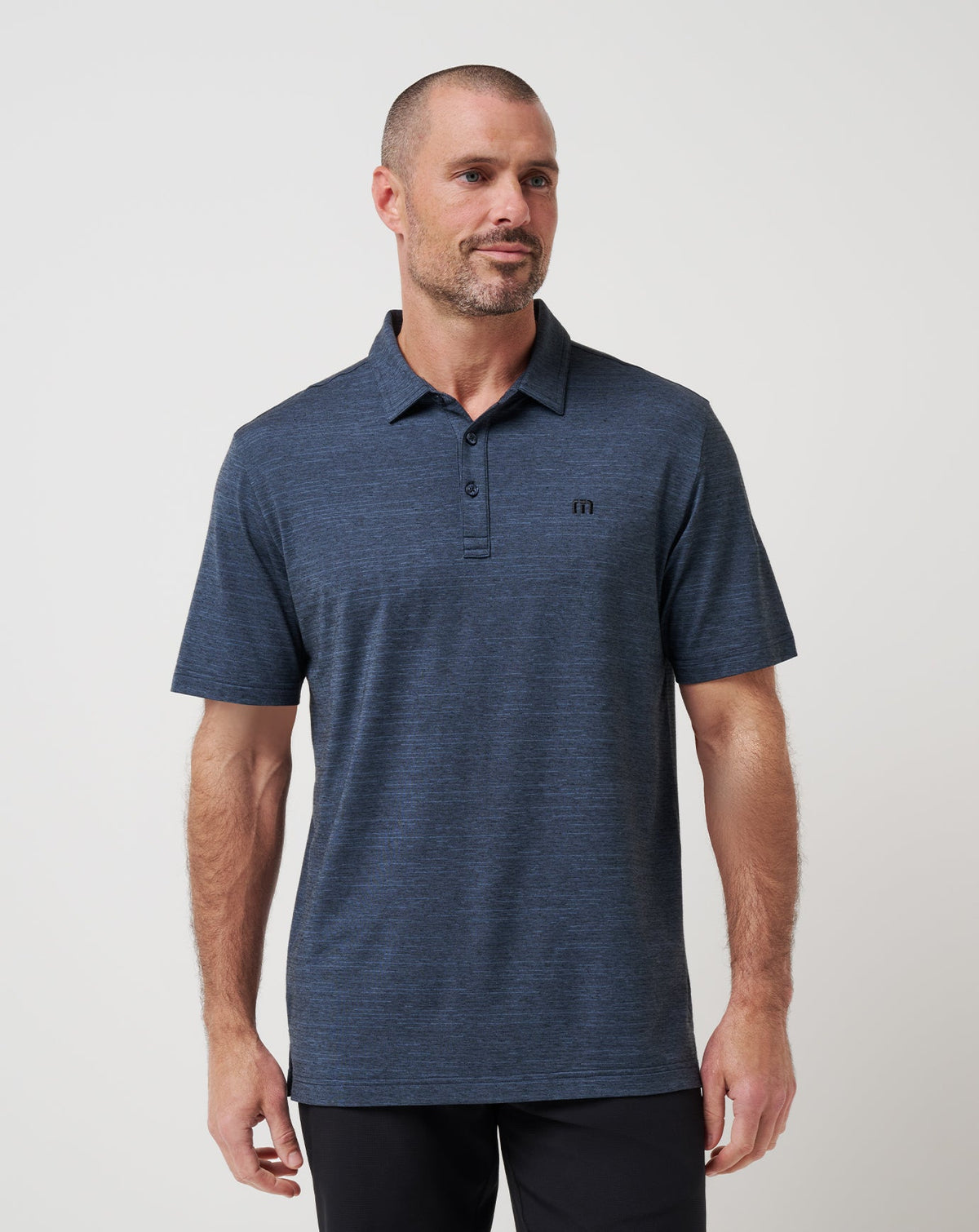 The Heater Polo Vintage Indigo/Black | Travis Mathew Signature