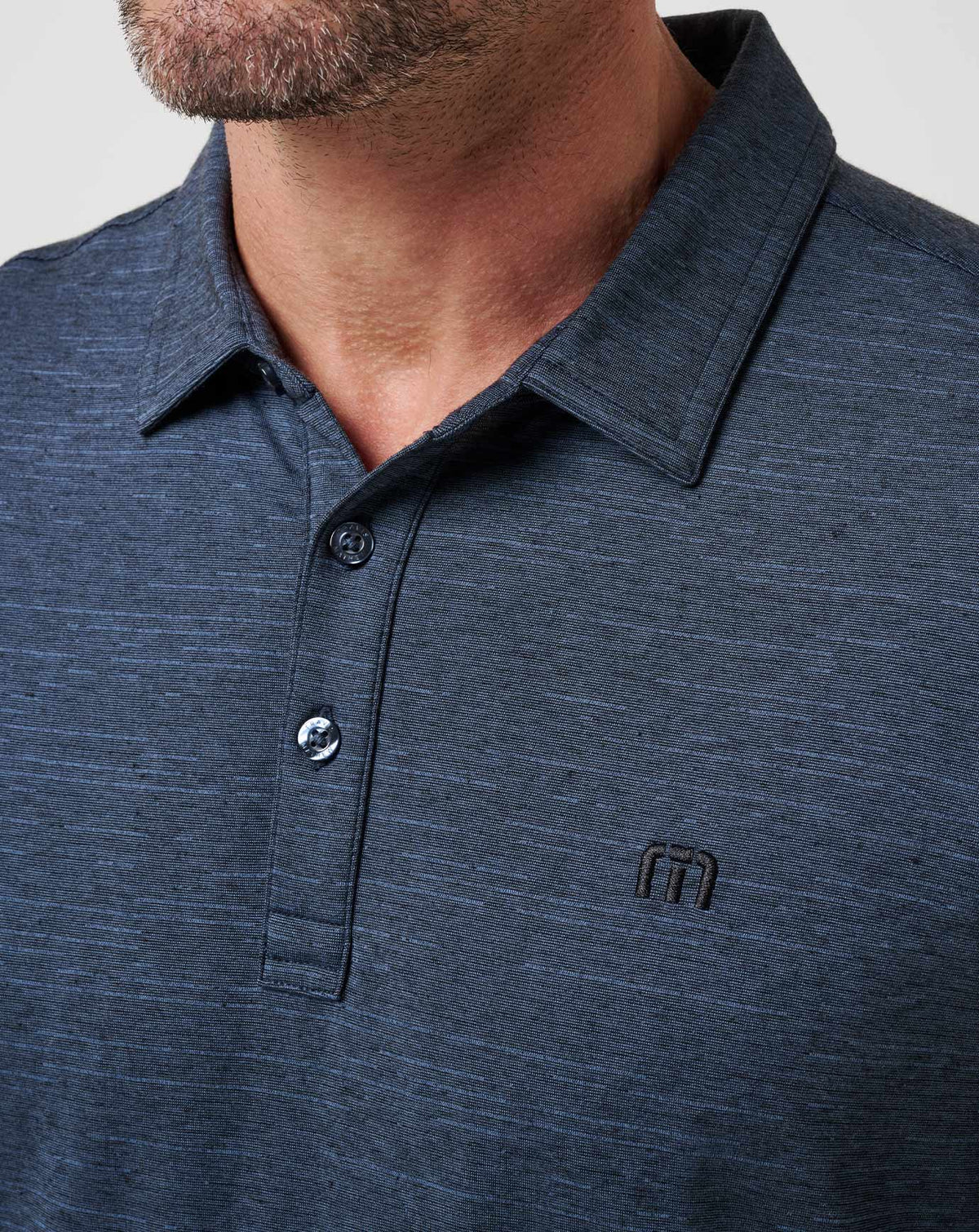 The Heater Polo Vintage Indigo/Black | Travis Mathew Signature