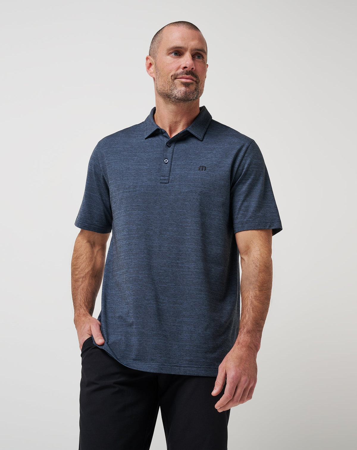 The Heater Polo Vintage Indigo/Black | Travis Mathew Signature