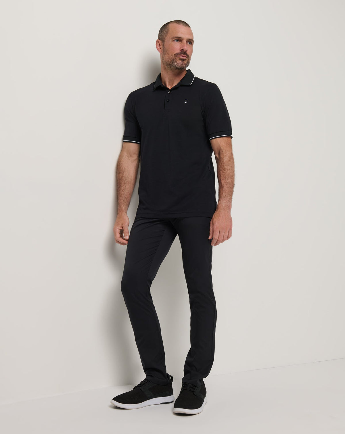 Happier Hour Polo Black | Travis Mathew Smart Buy