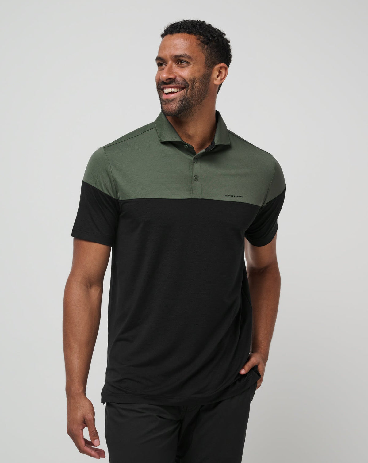 Heater Pro Color Block Polo Dark Olive | Travis Mathew Best Seller