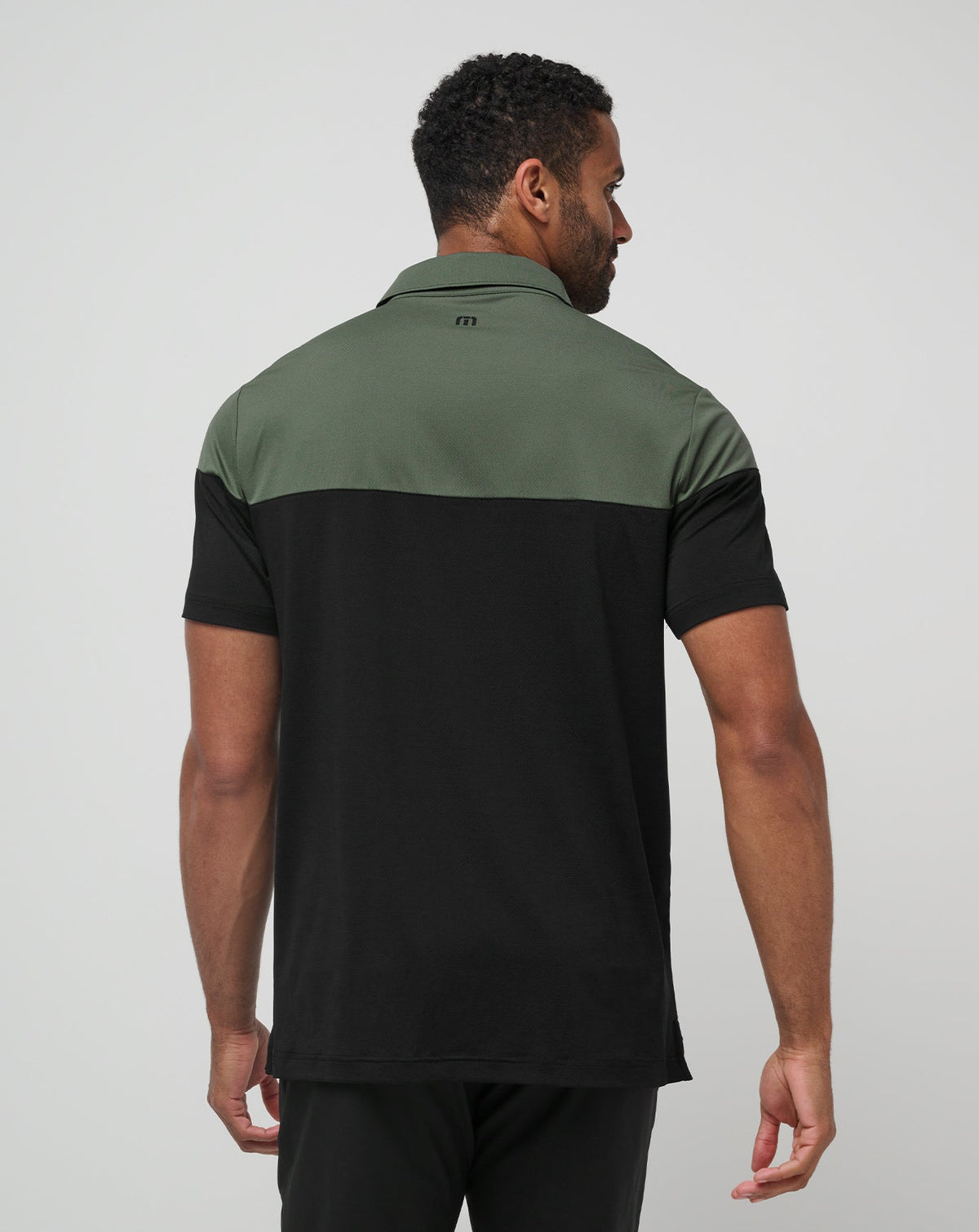 Heater Pro Color Block Polo Dark Olive | Travis Mathew Best Seller