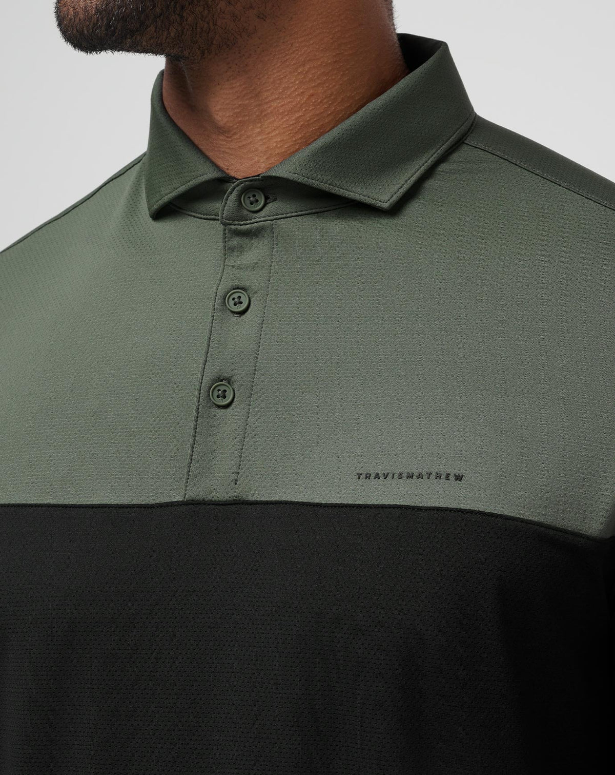 Heater Pro Color Block Polo Dark Olive | Travis Mathew Best Seller