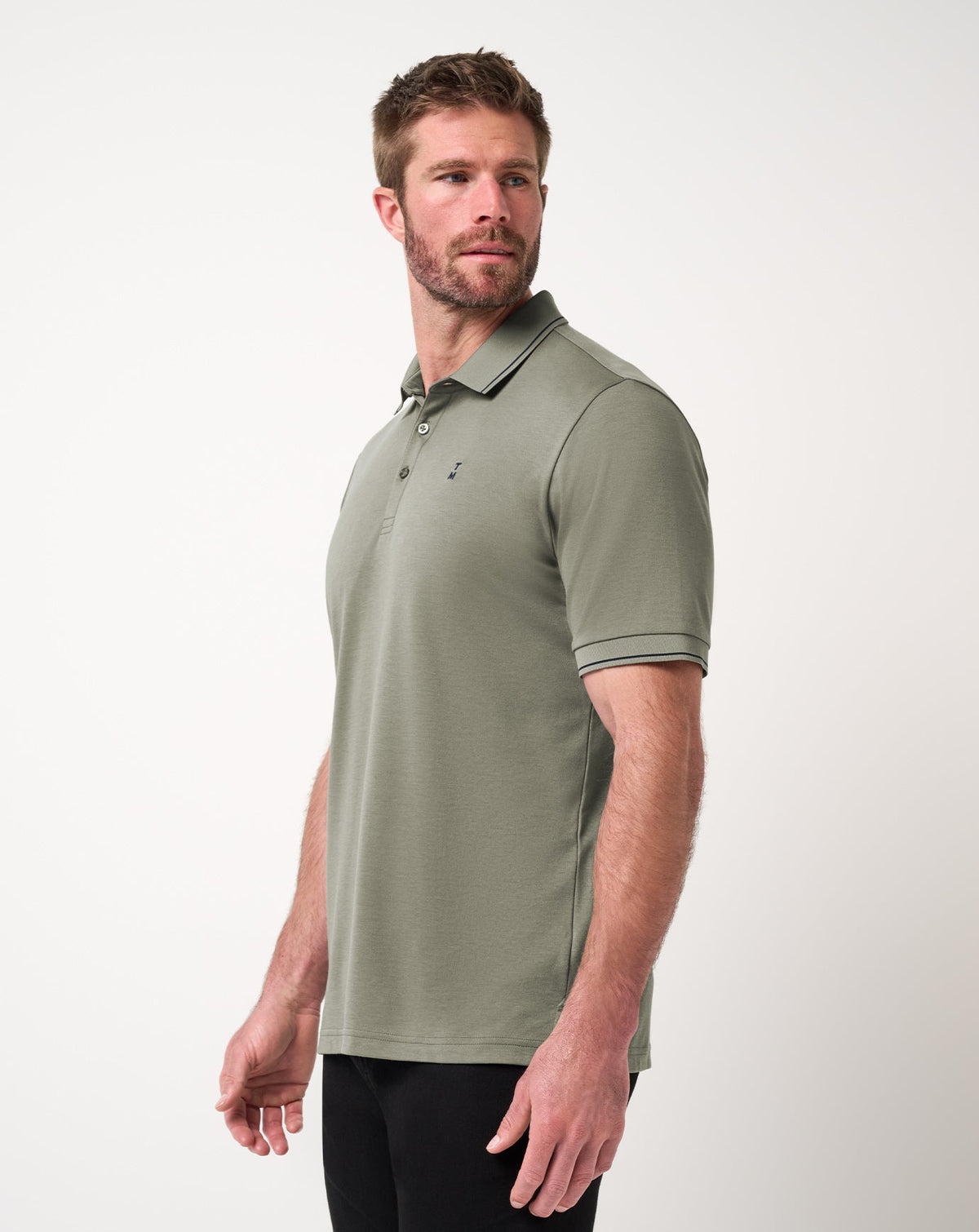 Happier Hour Polo Dark Olive | Travis Mathew Essential