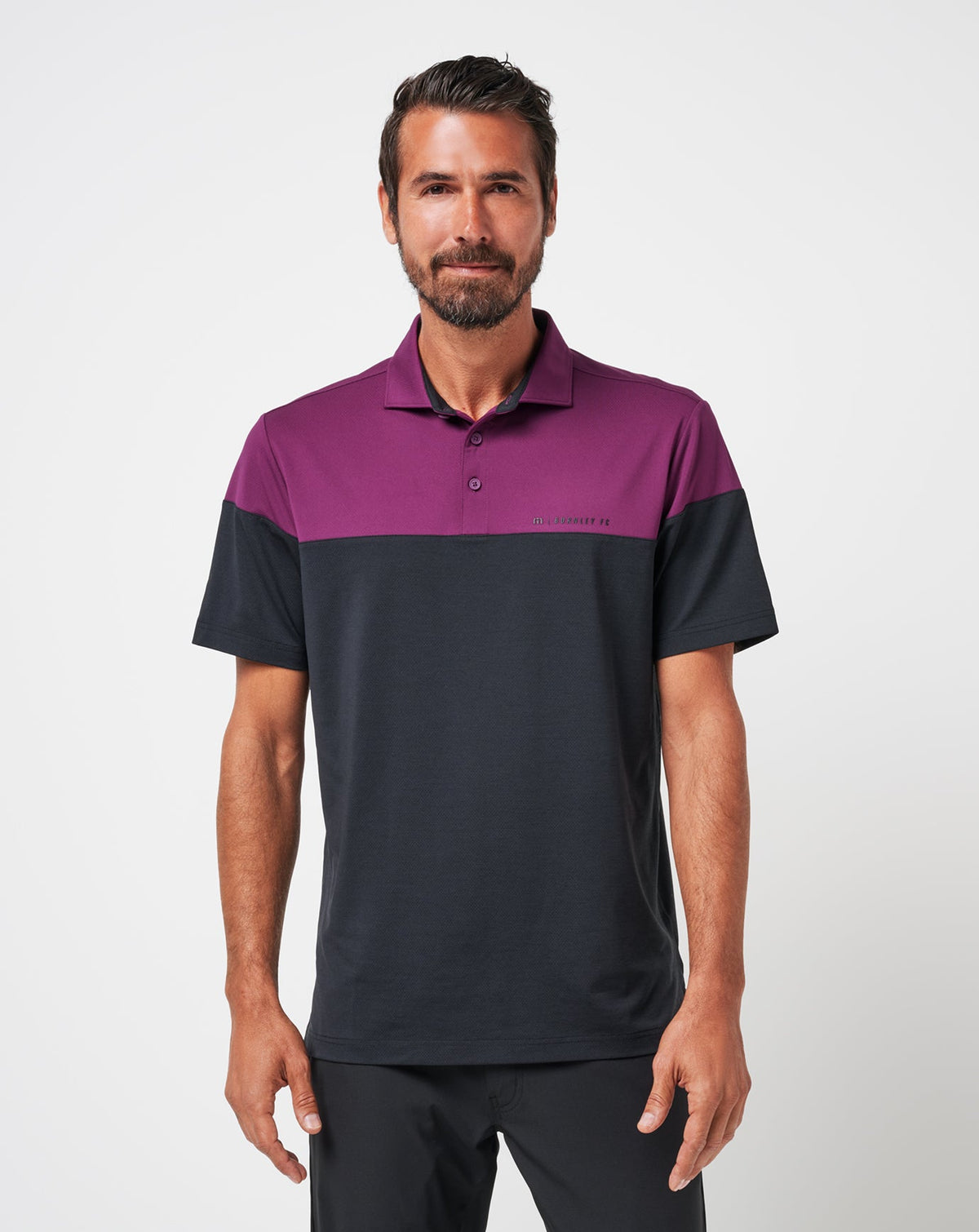 Burnley Pushback Polo Black | Travis Mathew Premium