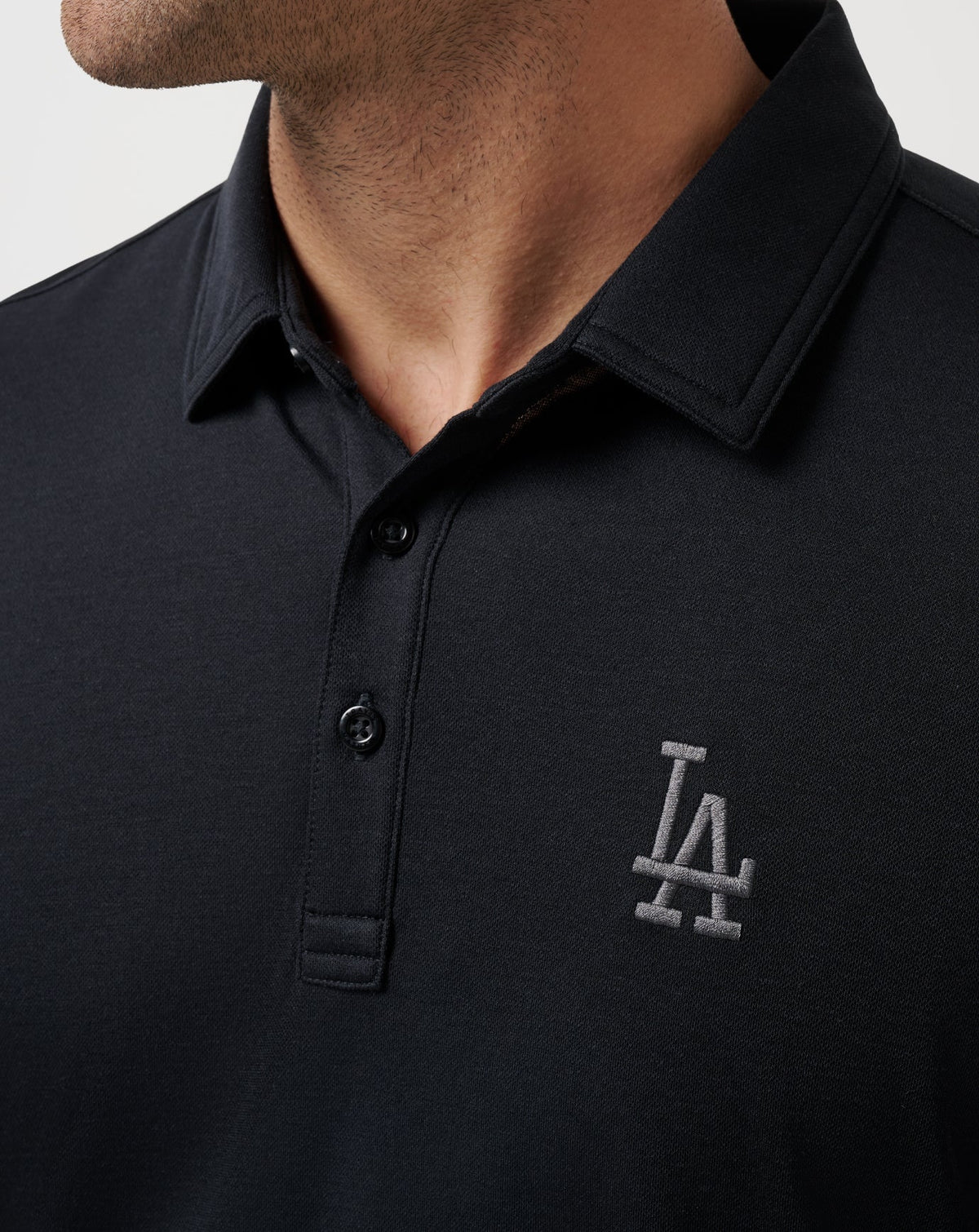 Los Angeles Dodgers Playoff Pitch Polo Black | Travis Mathew Everyday