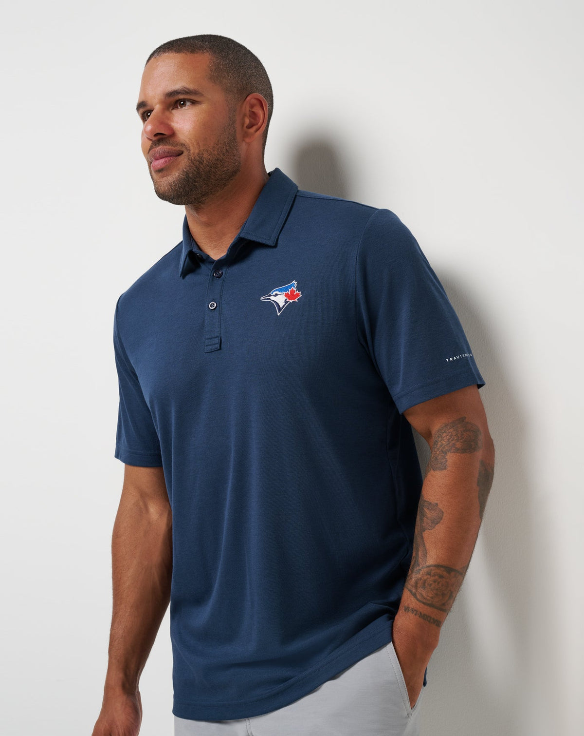Toronto Blue Jays Playoff Pitch Polo Navy | Travis Mathew Smart Buy