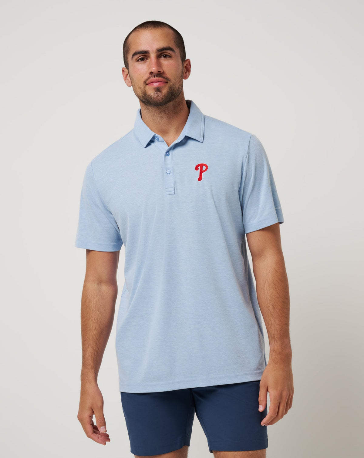 Philadelphia Phillies Playoff Pitch Polo Heather Blue | Travis Mathew Best Seller