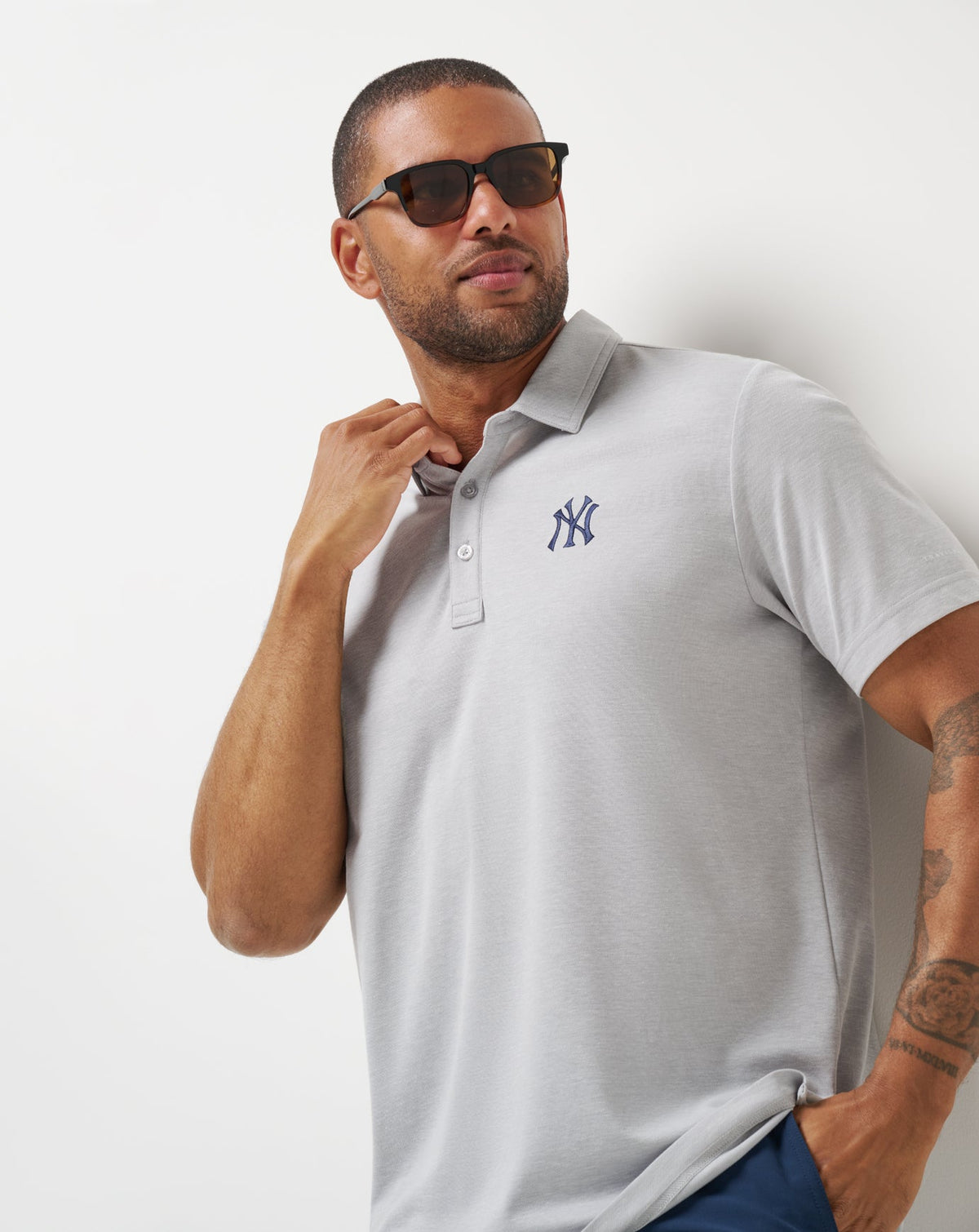 New York Yankees Playoff Pitch Polo Heather Grey | Travis Mathew Value