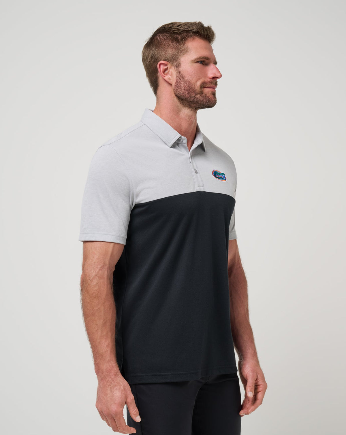 Florida Drop Back Polo Heather Grey/Black | Travis Mathew Featured
