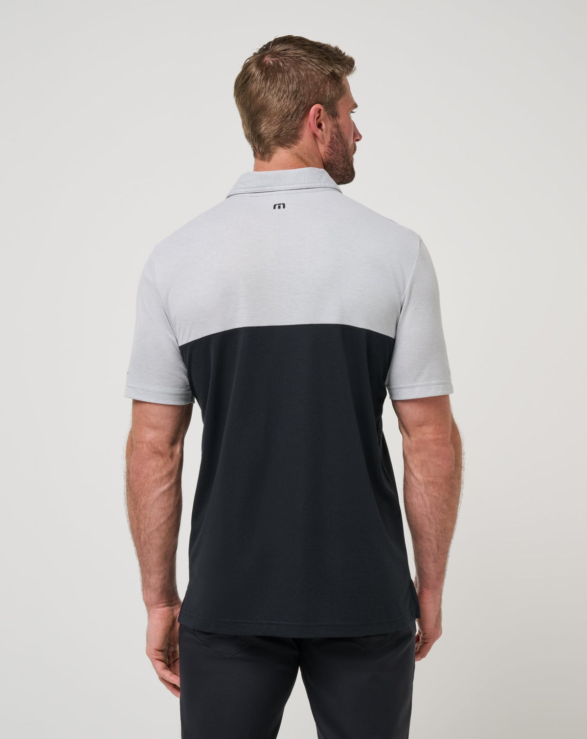 Florida Drop Back Polo Heather Grey/Black | Travis Mathew Featured