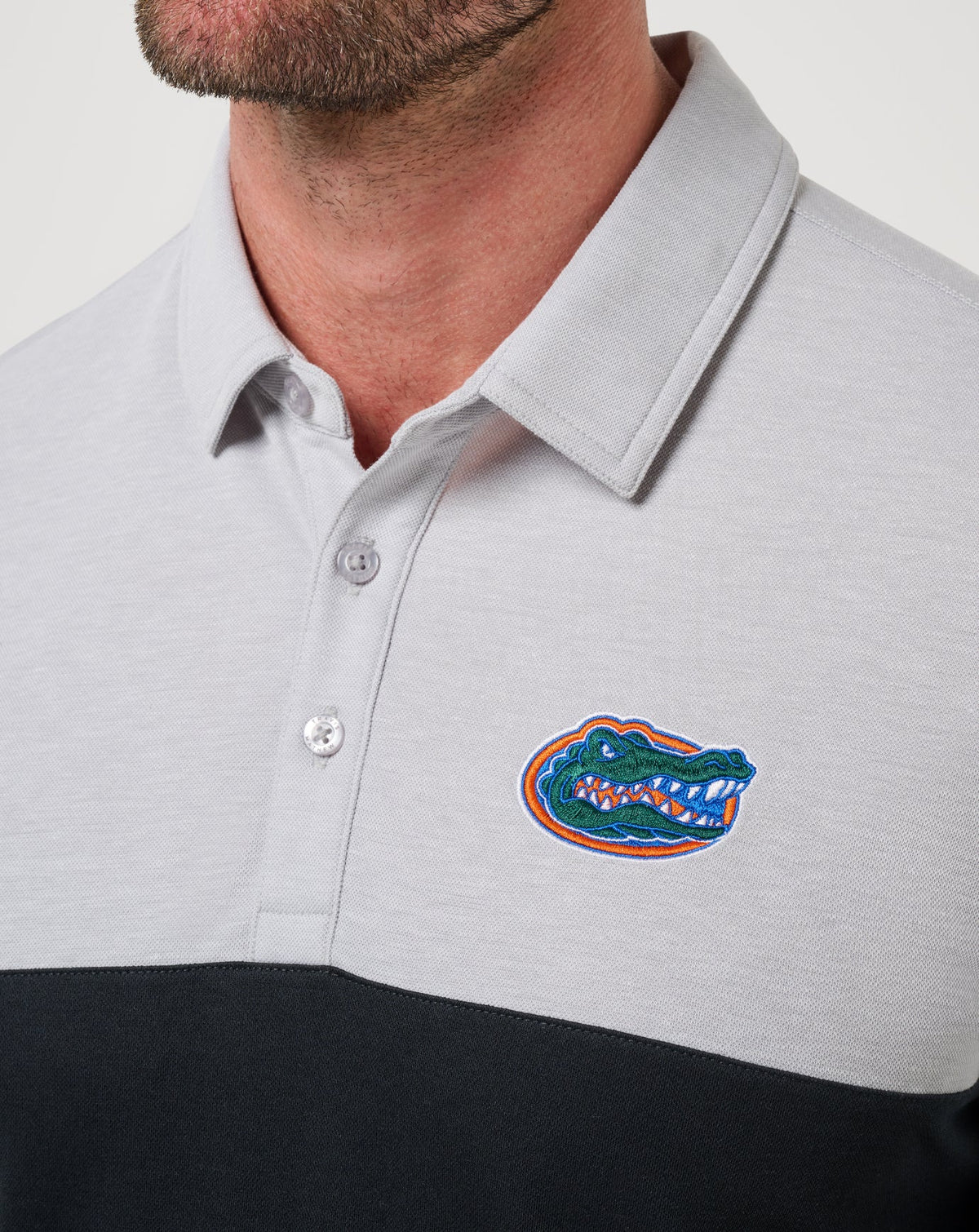 Florida Drop Back Polo Heather Grey/Black | Travis Mathew Featured