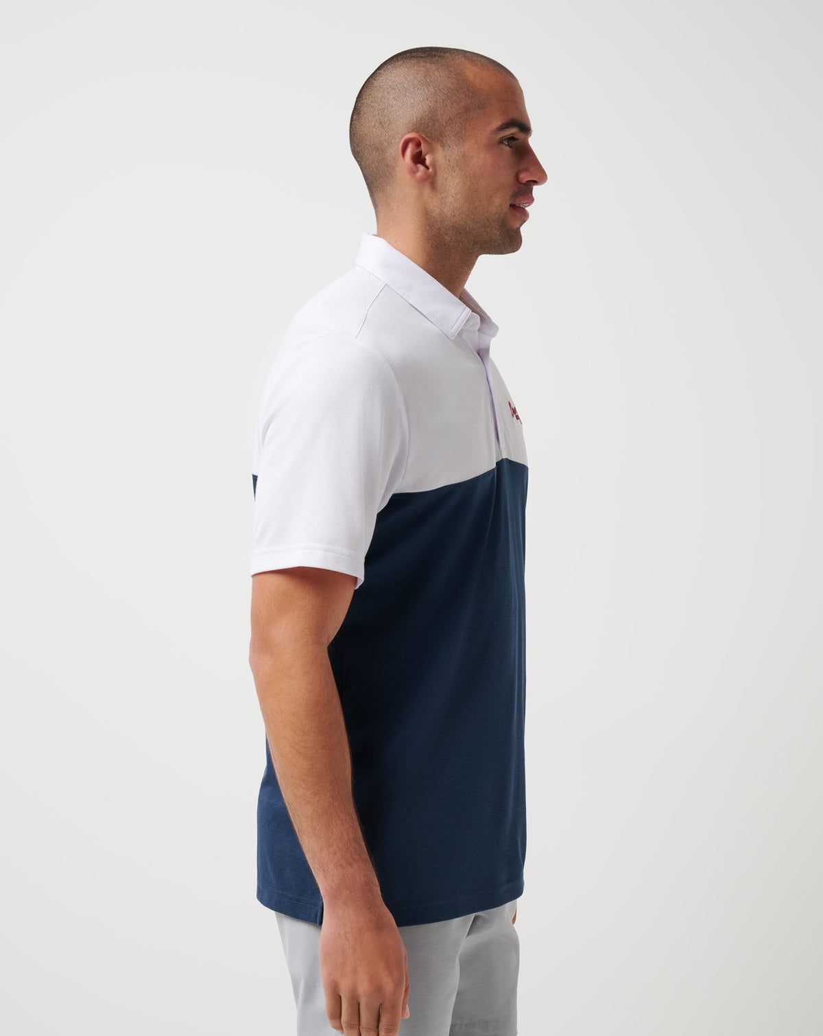 Atlanta Braves Home Run Leader Polo White/Navy | Travis Mathew Top Pick