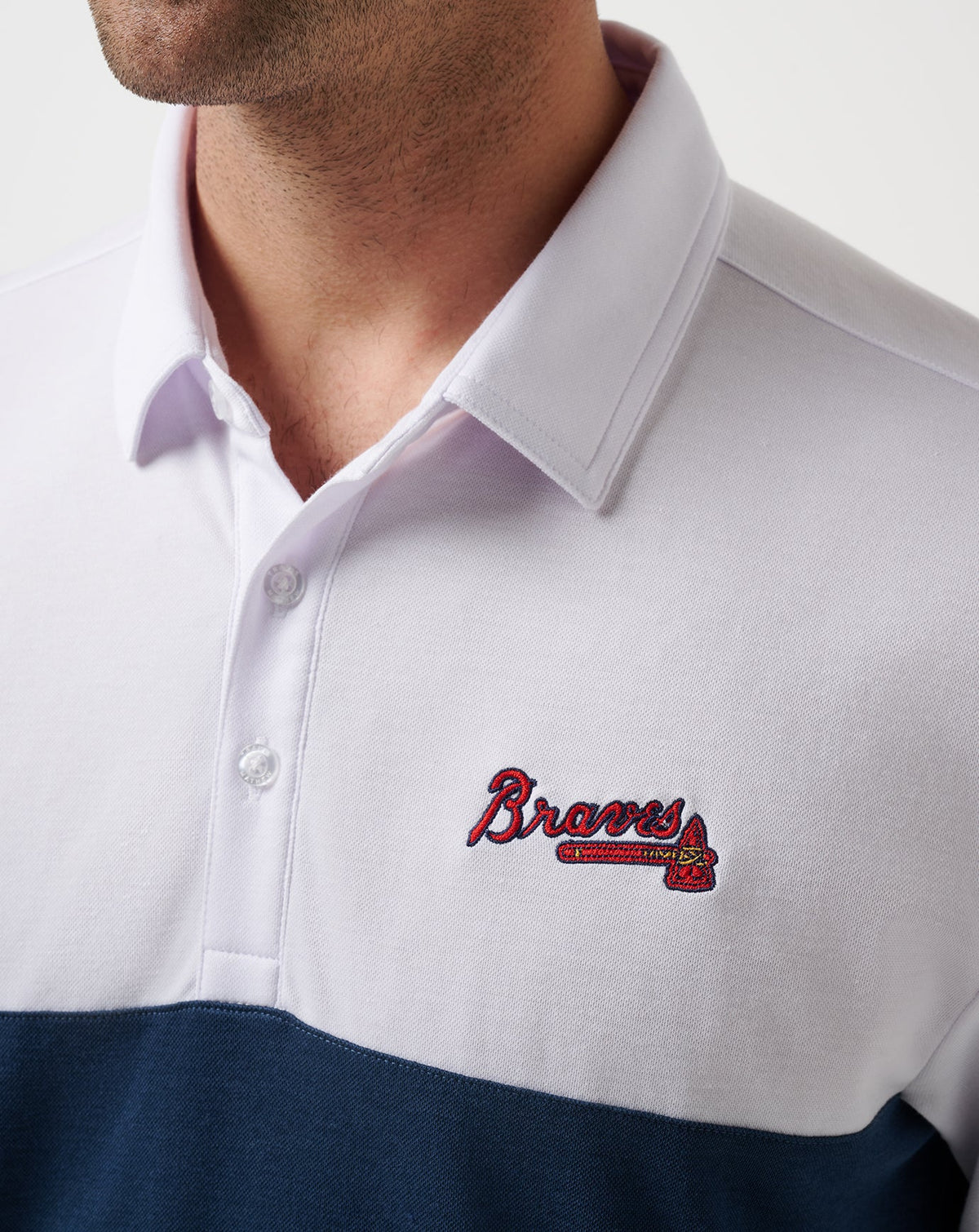 Atlanta Braves Home Run Leader Polo White/Navy | Travis Mathew Top Pick