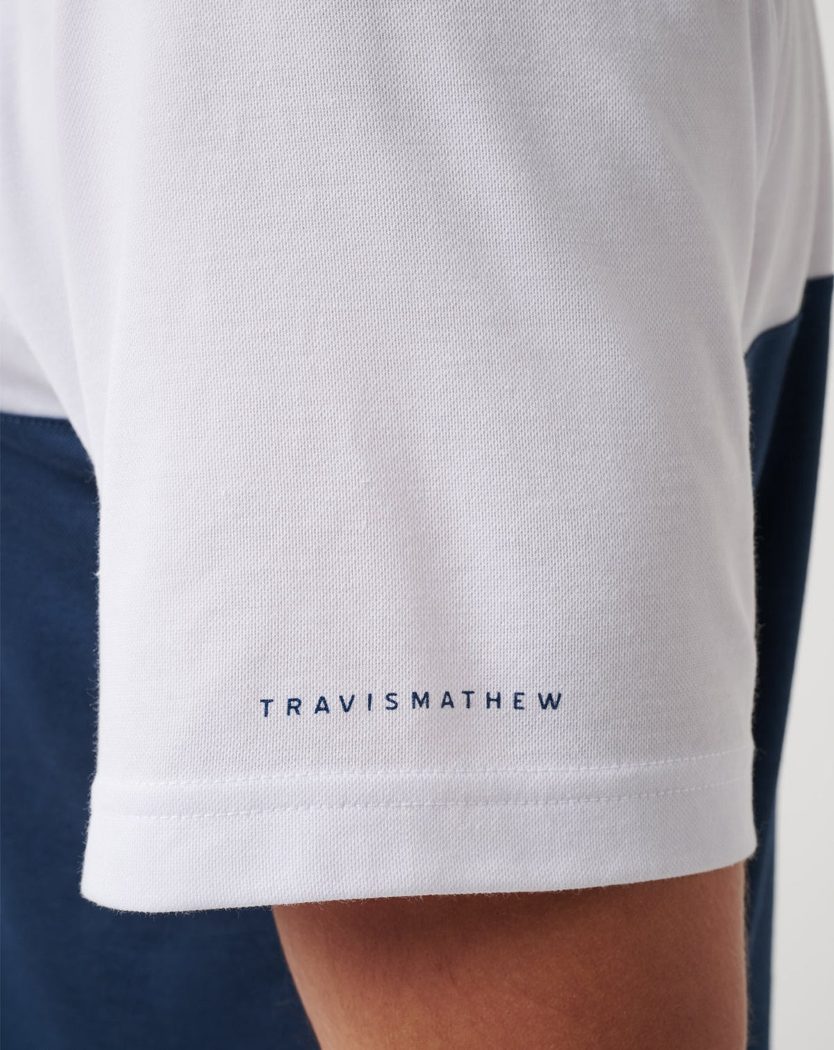 Atlanta Braves Home Run Leader Polo White/Navy | Travis Mathew Top Pick