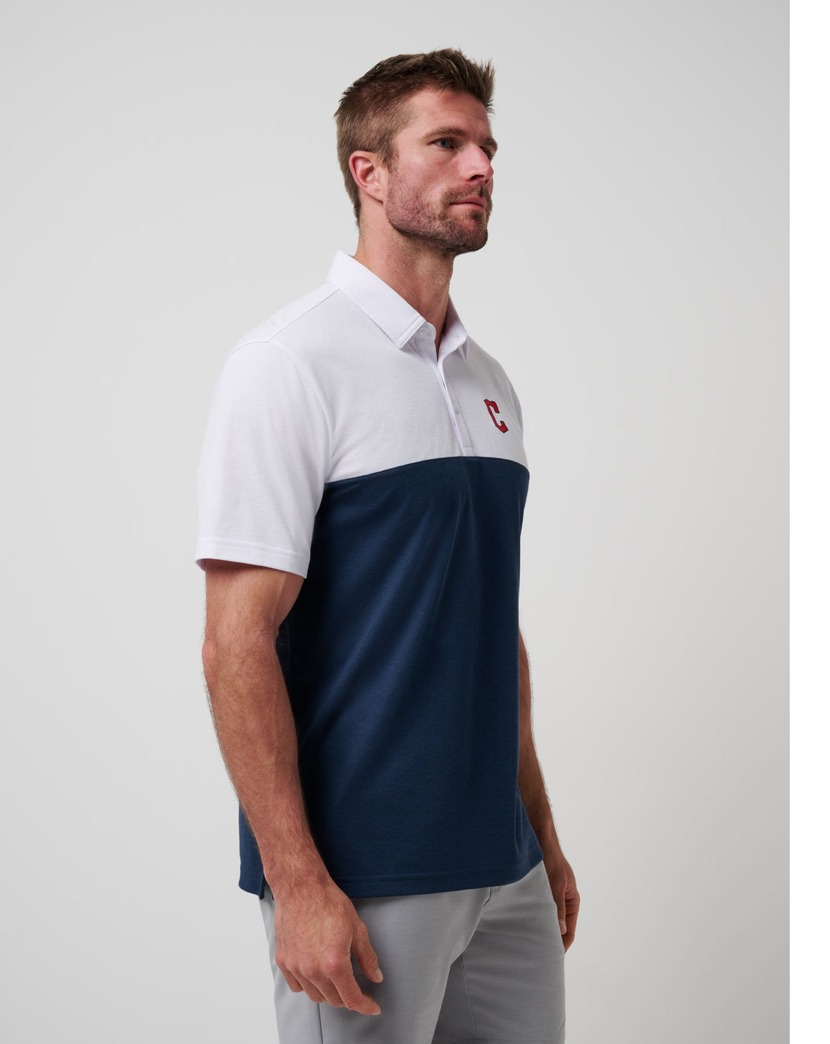 Cleveland Guardians Home Run Leader Polo White/Navy | Travis Mathew Premium