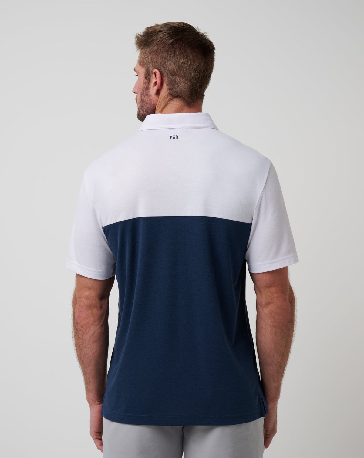 Cleveland Guardians Home Run Leader Polo White/Navy | Travis Mathew Premium