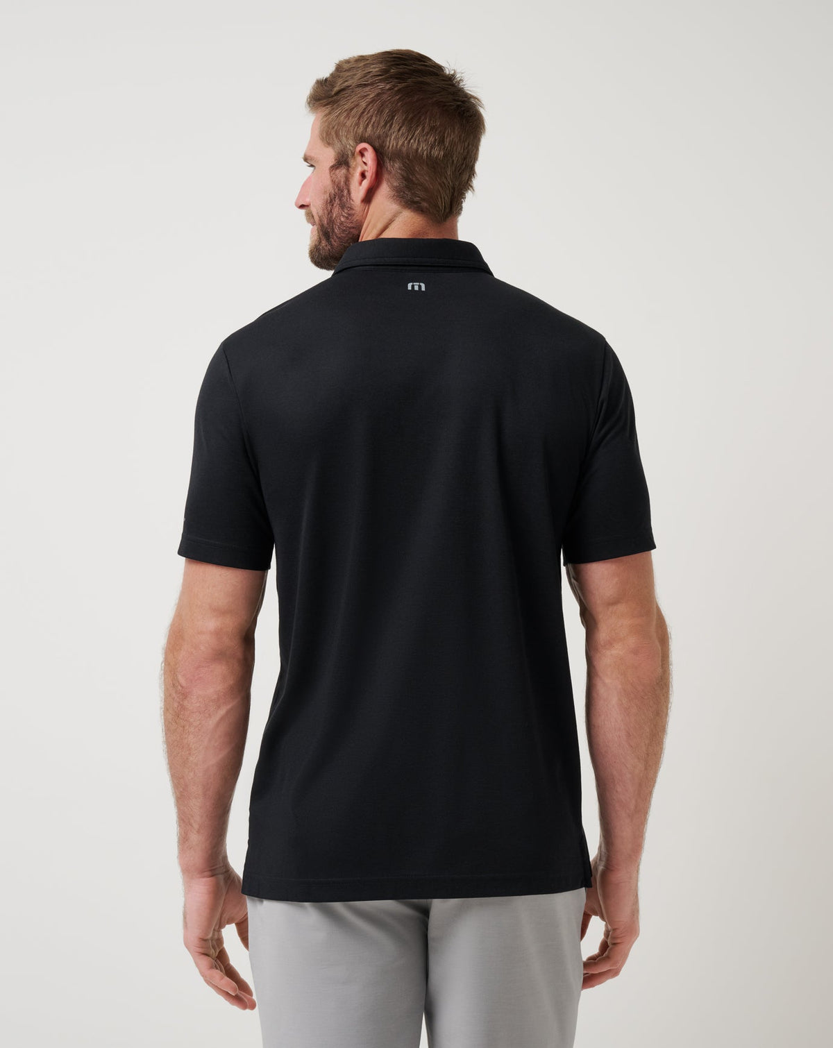 Baltimore Orioles Playoff Pitch Polo Black | Travis Mathew Essential