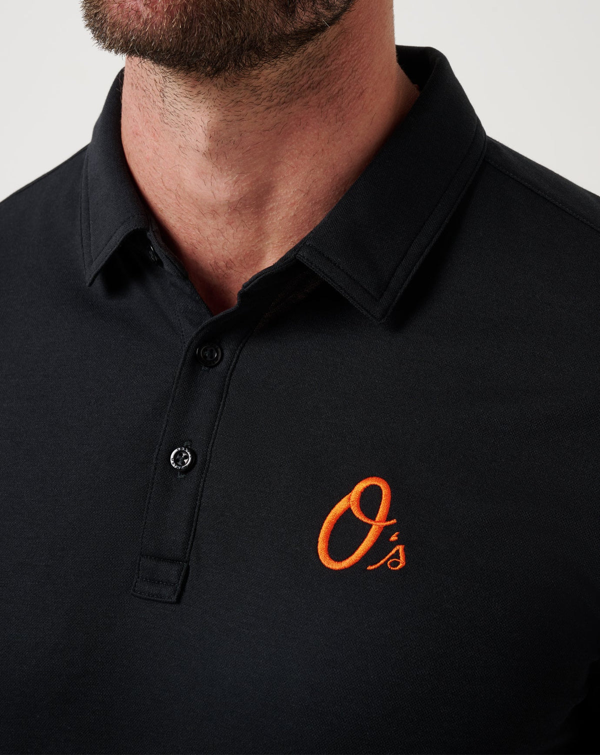 Baltimore Orioles Playoff Pitch Polo Black | Travis Mathew Essential