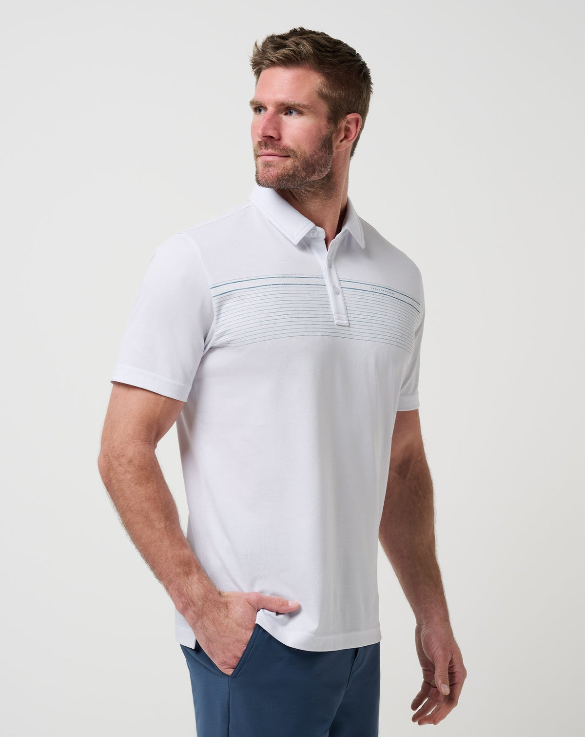 Overstay Polo White | Travis Mathew Signature