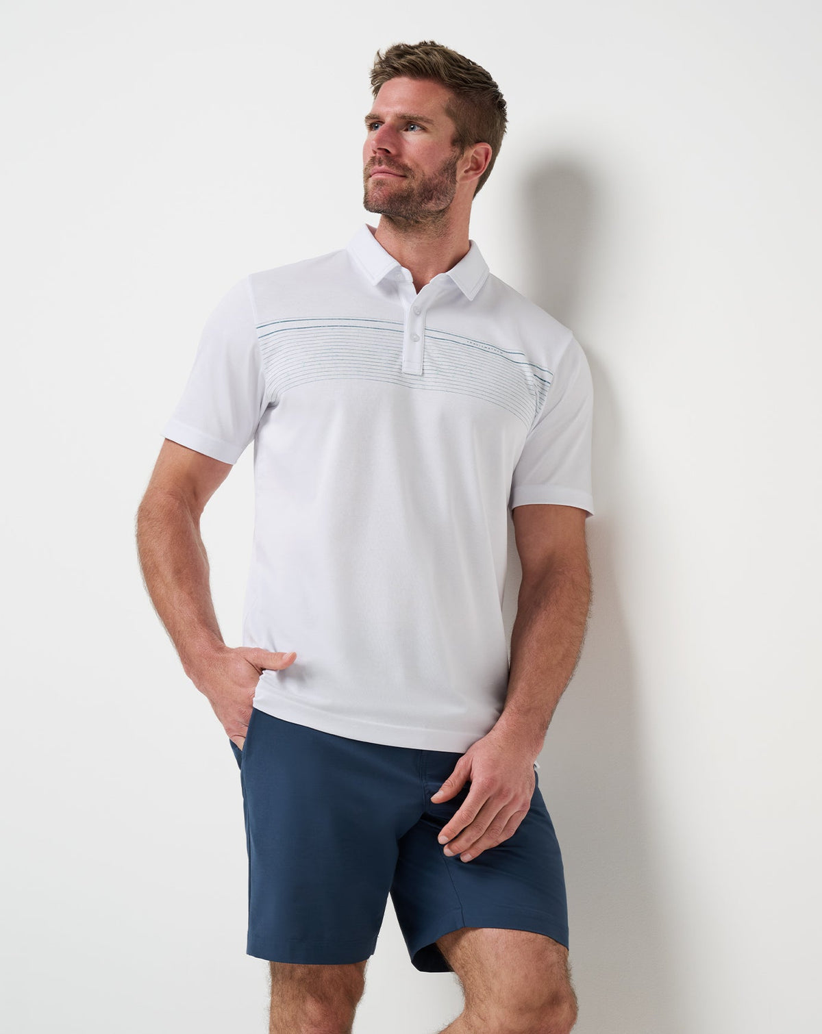 Overstay Polo White | Travis Mathew Signature