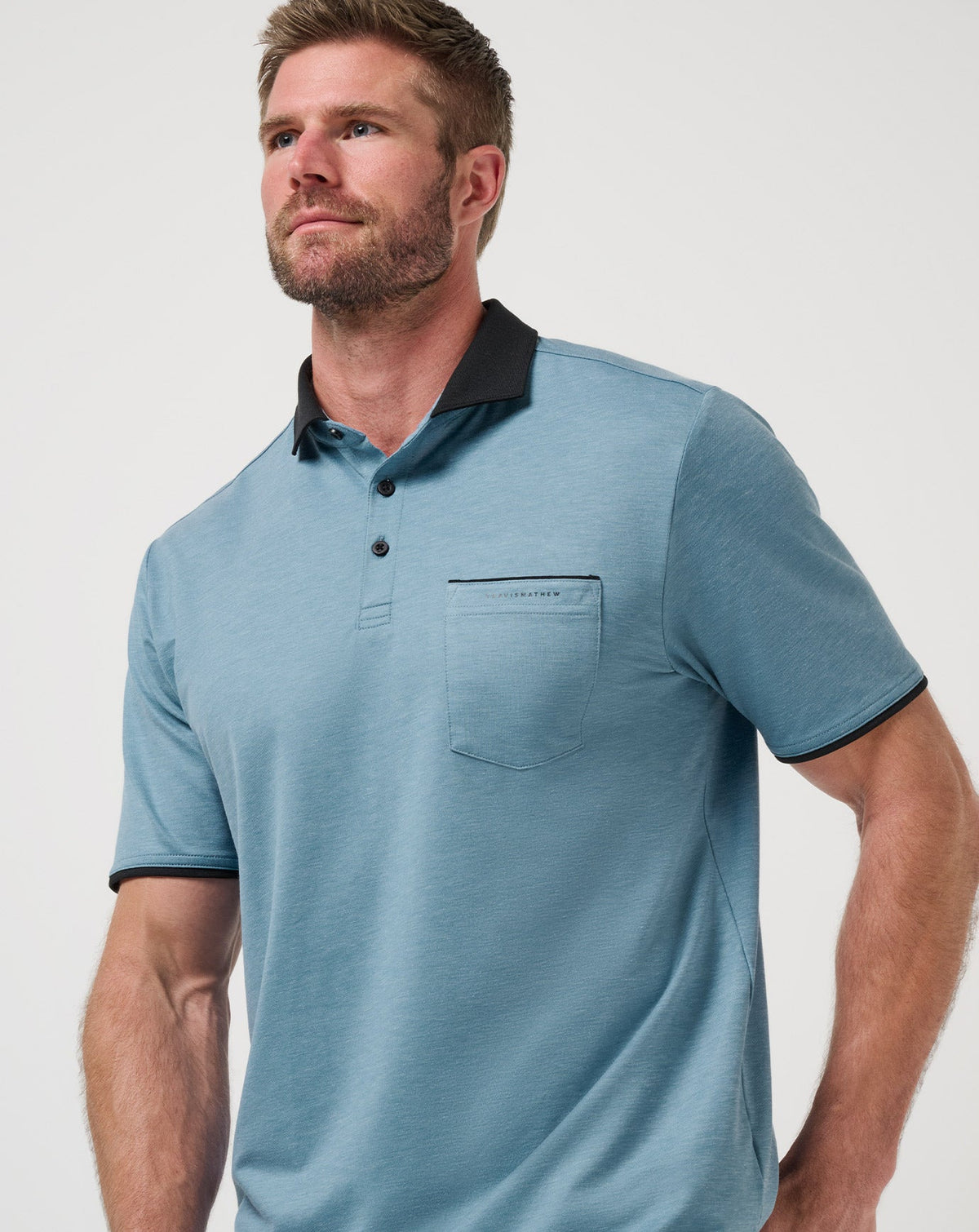 Featherweight Pocket Polo Captains Blue | Travis Mathew Essential