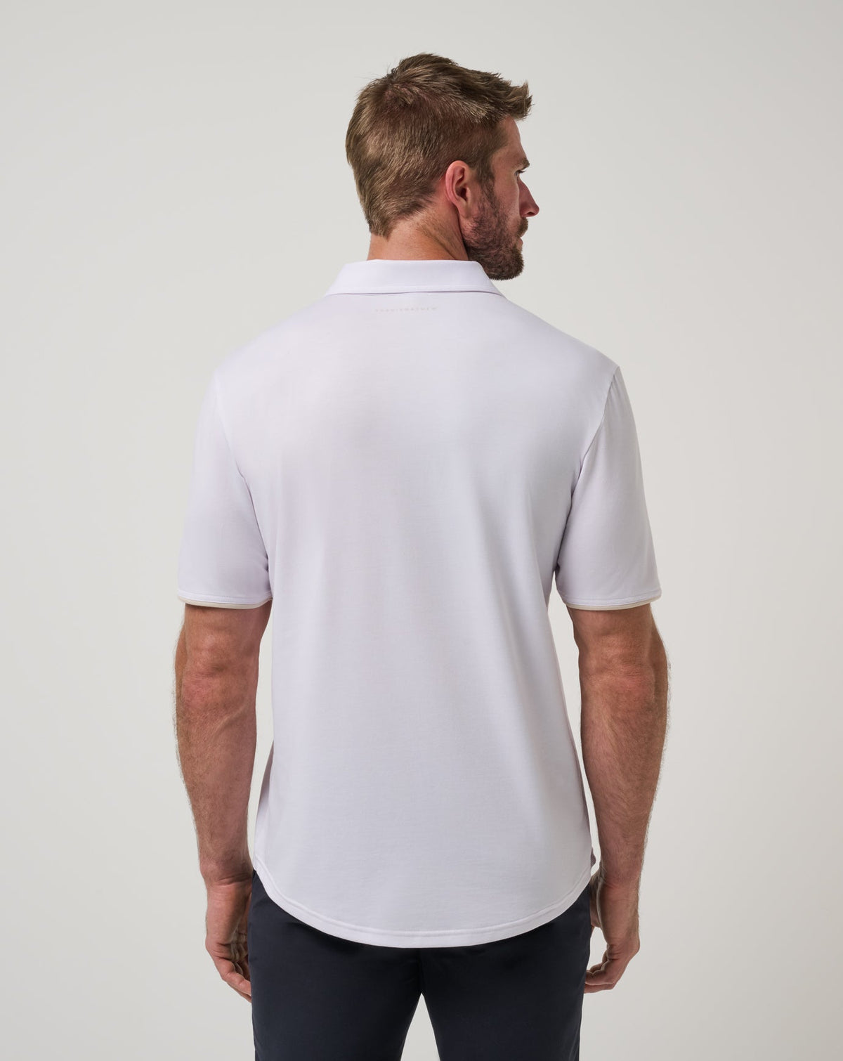 Featherweight On The Grind Polo White | Travis Mathew Essential