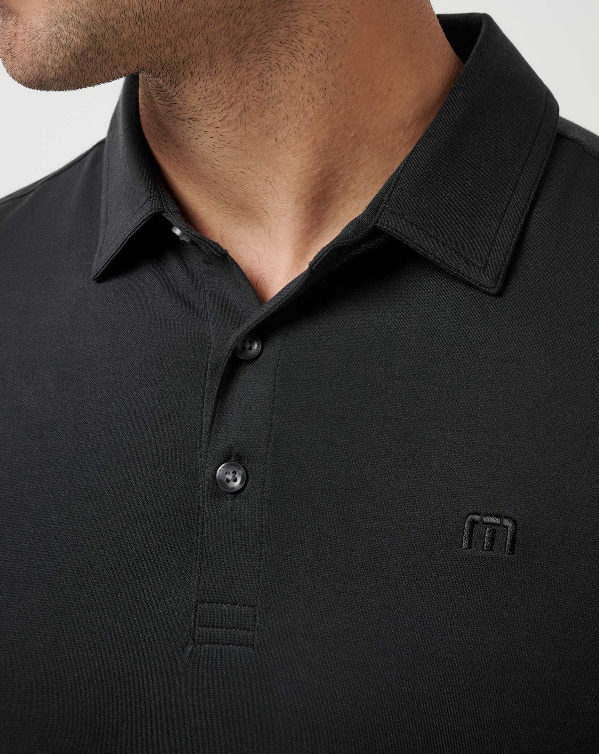 Featherweight Polo Black | Travis Mathew Trending