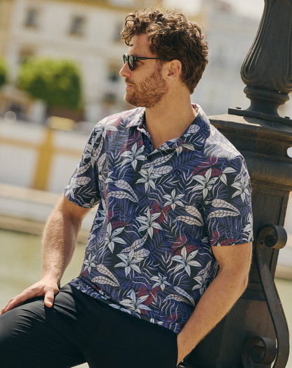 Featherweight Open Bay Polo Black | Travis Mathew Essential