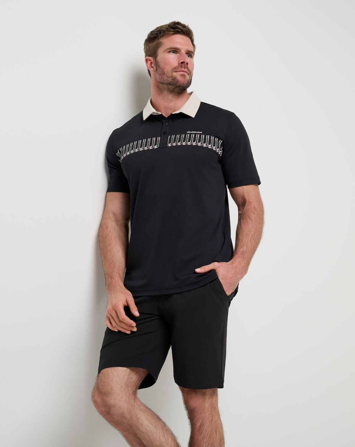 Stick Side Polo Black | Travis Mathew Best Seller