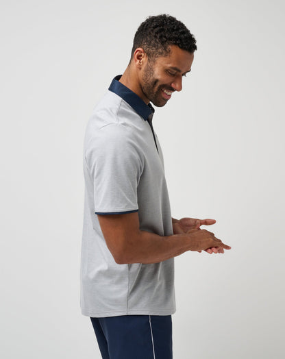 Home Game Polo Heather Light Grey | Travis Mathew Best Seller