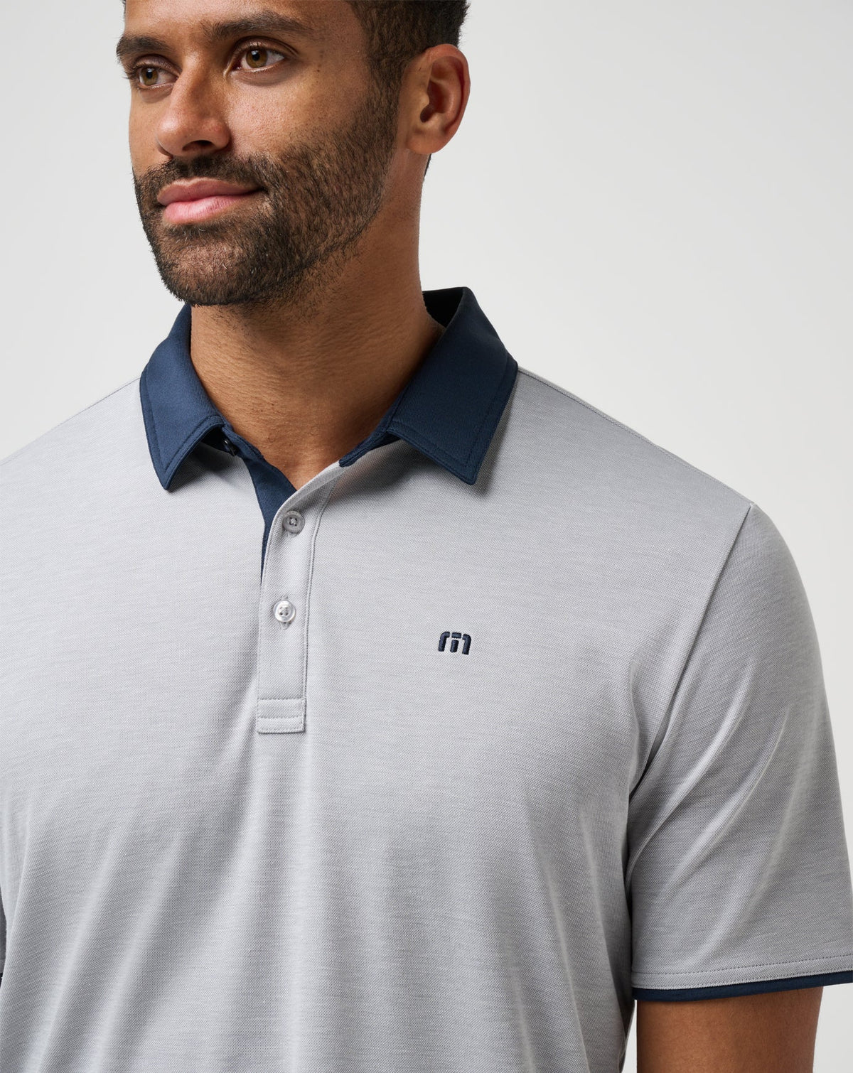 Home Game Polo Heather Light Grey | Travis Mathew Best Seller