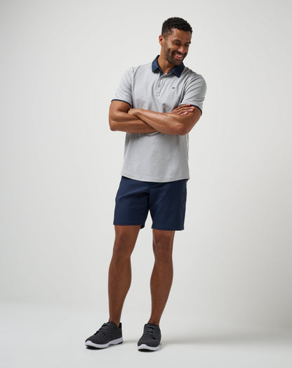 Home Game Polo Heather Light Grey | Travis Mathew Best Seller