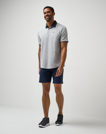Home Game Polo Heather Light Grey | Travis Mathew Best Seller