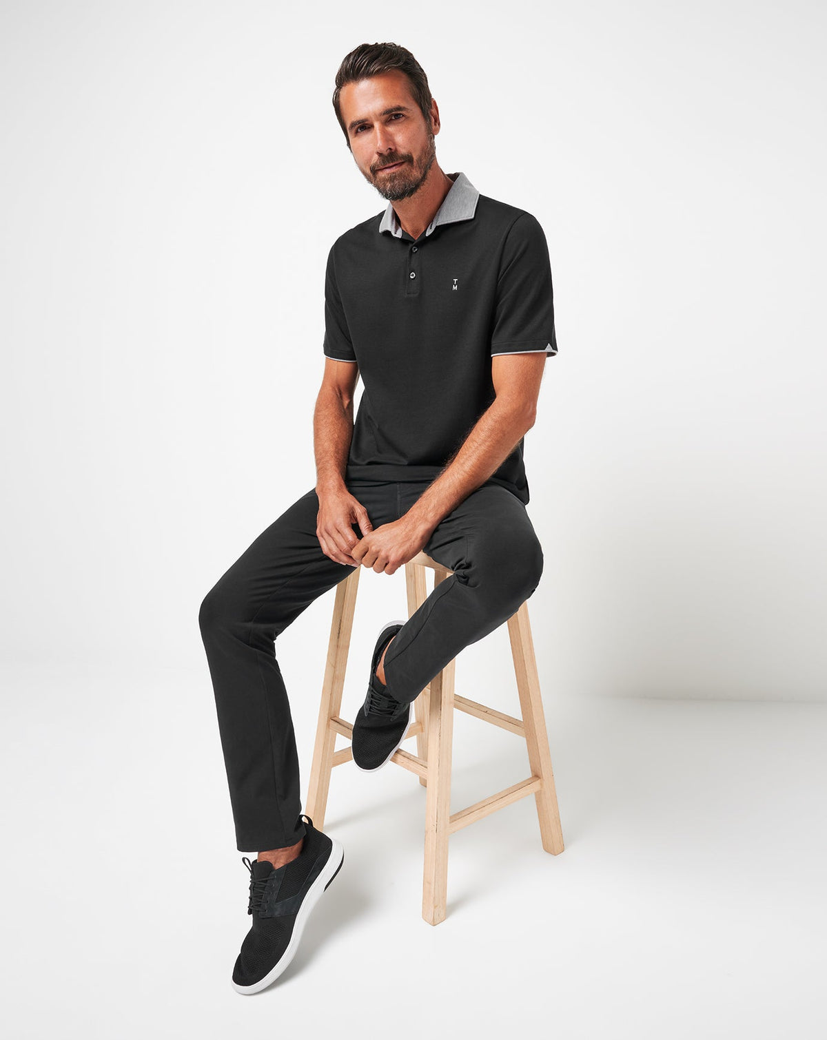 Reservation Number Polo Black | Travis Mathew Best Seller