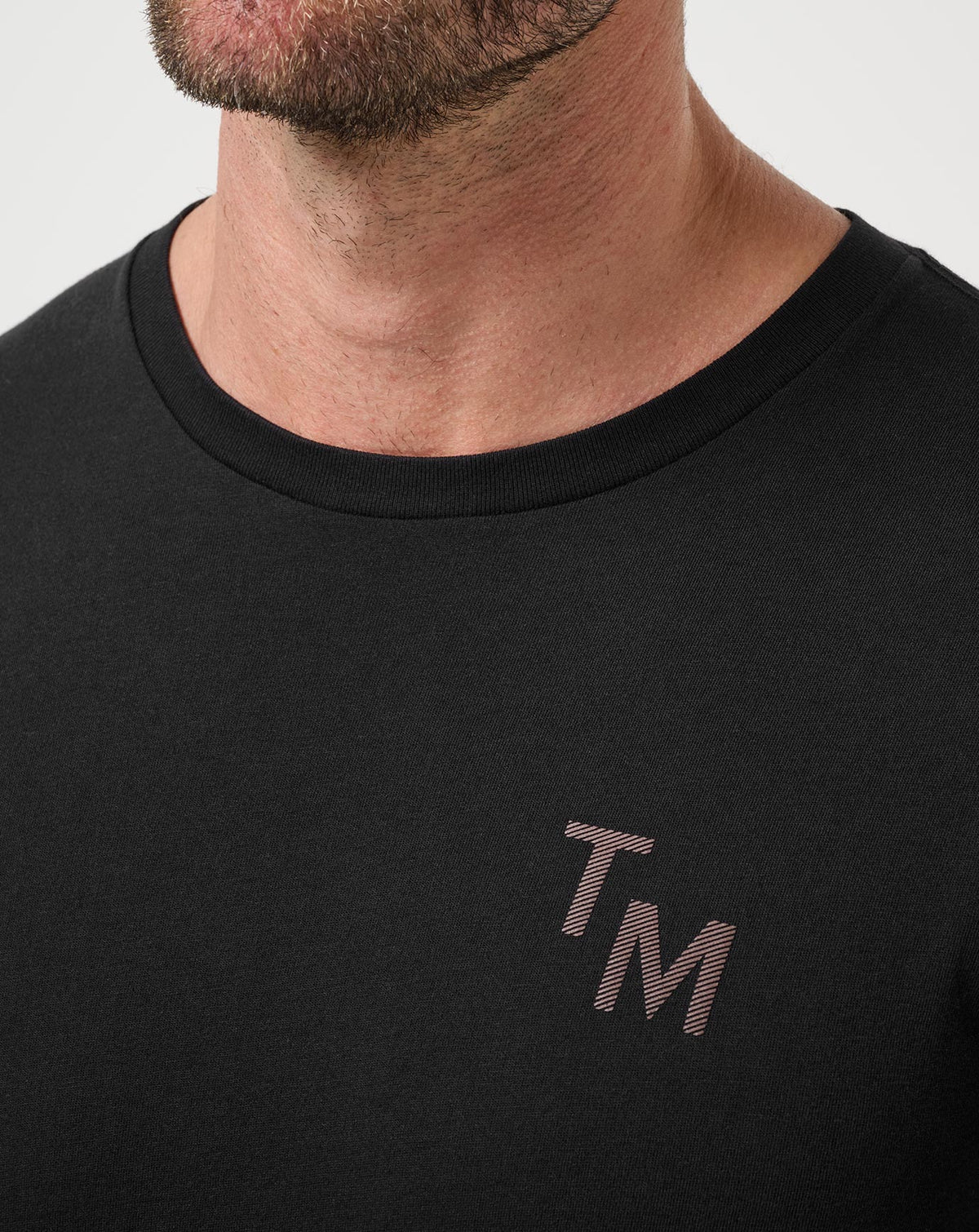 End Around Tee Black | Travis Mathew Premium
