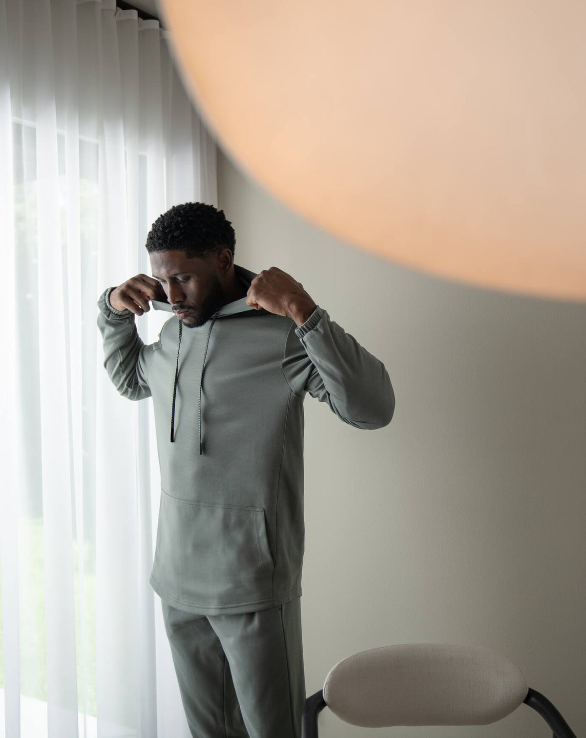 Upgraded Tech Hoodie Heather Grey | Travis Mathew Signature
