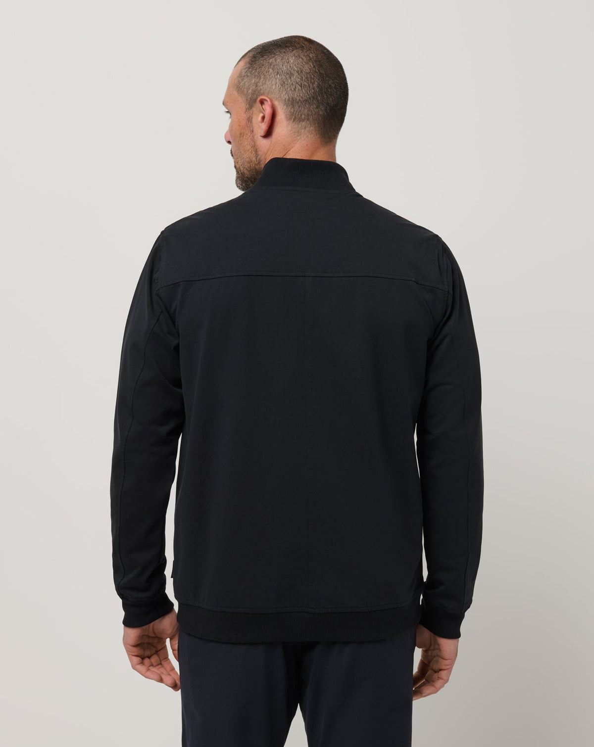 Stretchknit Bomber Jacket Black | Travis Mathew Premium