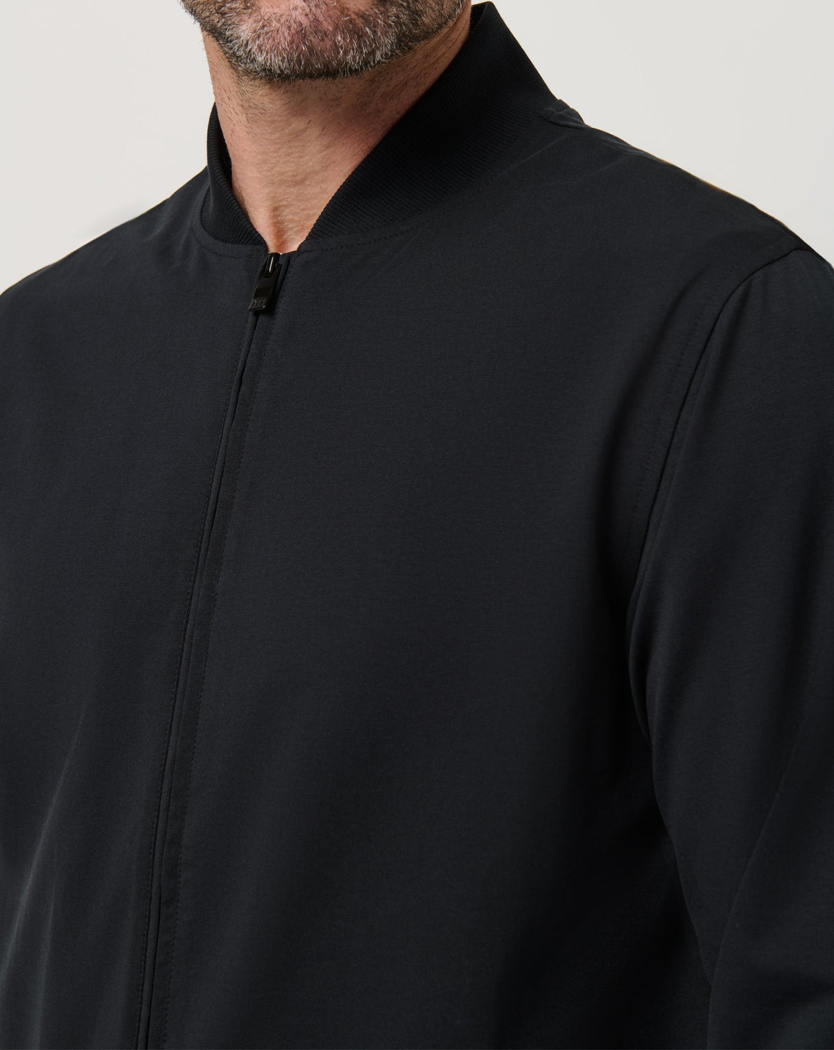 Stretchknit Bomber Jacket Black | Travis Mathew Premium