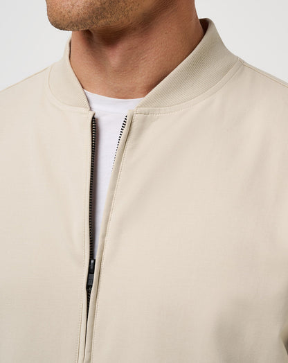 Stretchknit Bomber Jacket Italian Sand | Travis Mathew Latest