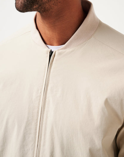 Lost Cave Jacket Italian Sand | Travis Mathew Great Value