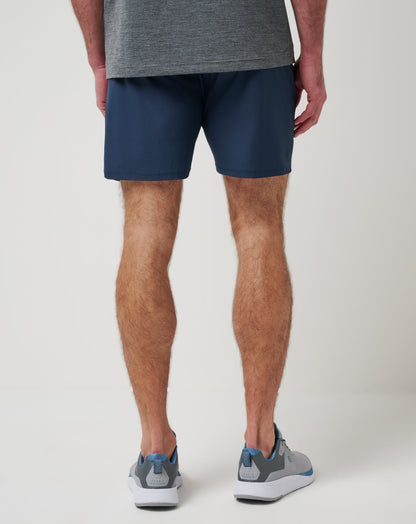 Wanderlust E-Waist Short 7.5In Mood Indigo | Travis Mathew Featured