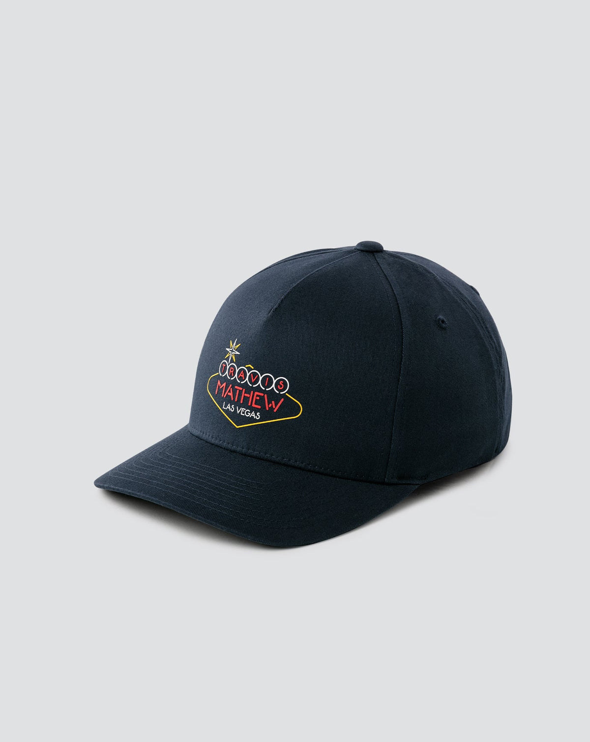 Neon Magic Snapback Hat Dark Blue | Travis Mathew Great Value