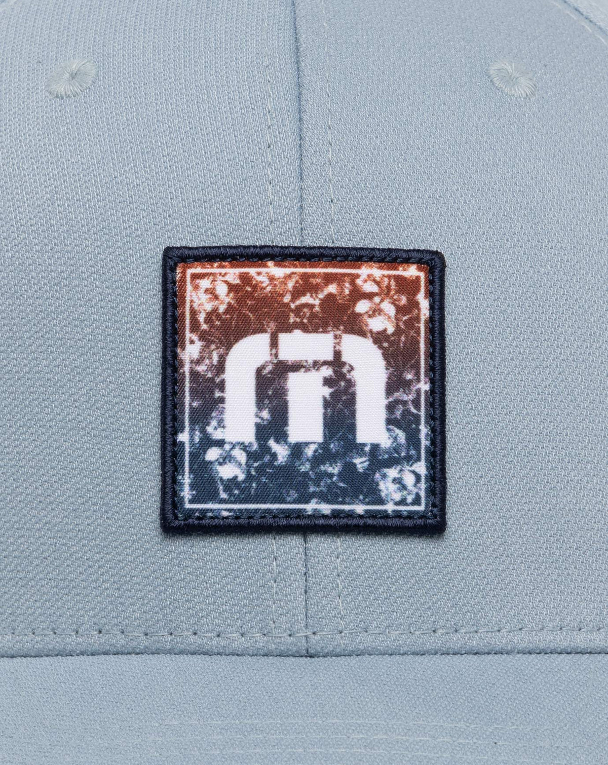 Table For Two Fitted Hat Heather Ash Blue | Travis Mathew Featured