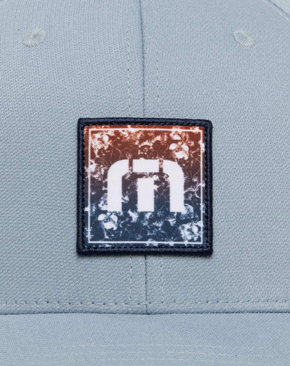 Table For Two Fitted Hat Heather Ash Blue | Travis Mathew Featured