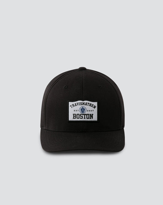 Boylston Fitted Hat Black | Travis Mathew Featured