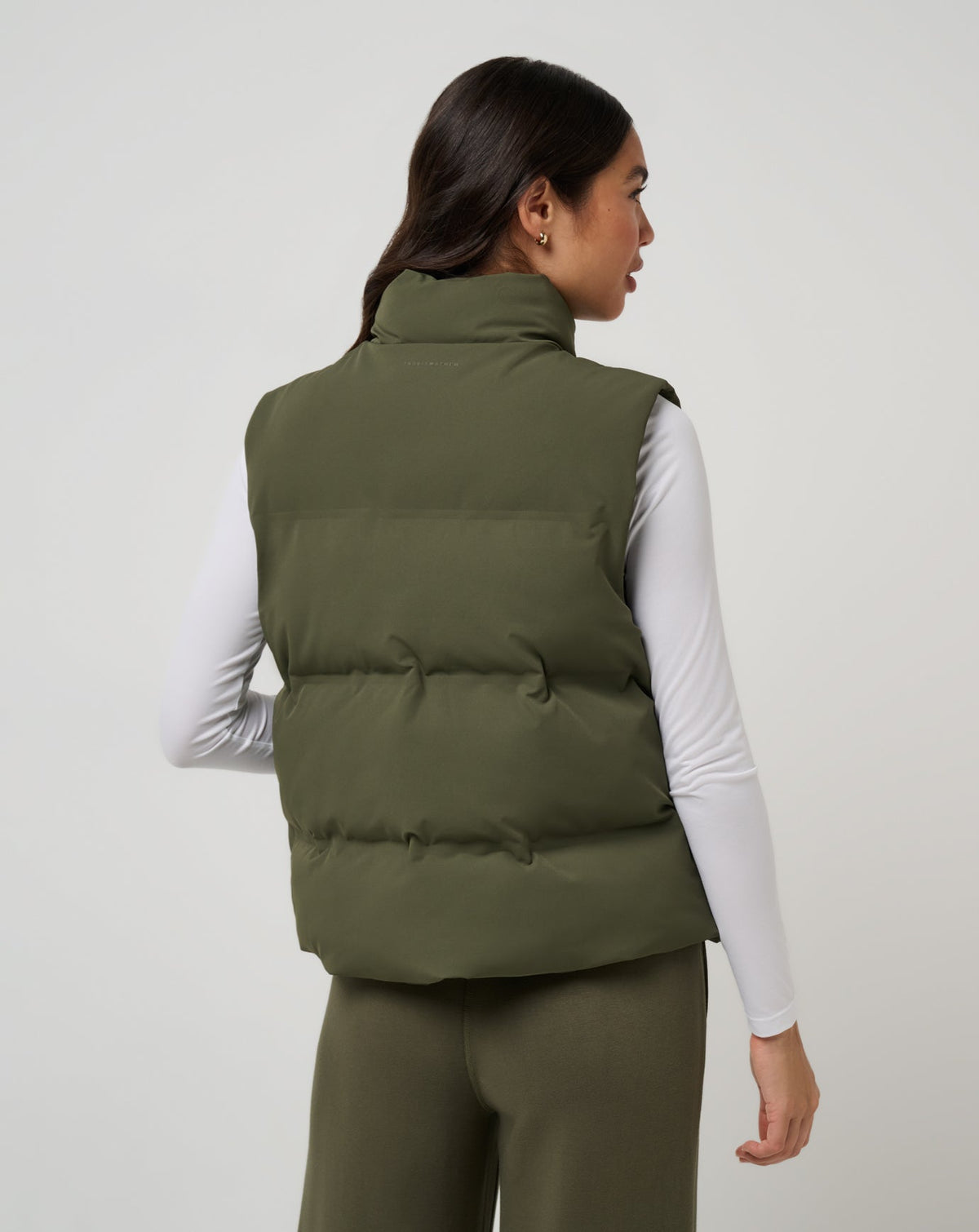Moontide Bonded Puffer Vest Grape Leaf | Travis Mathew Featured