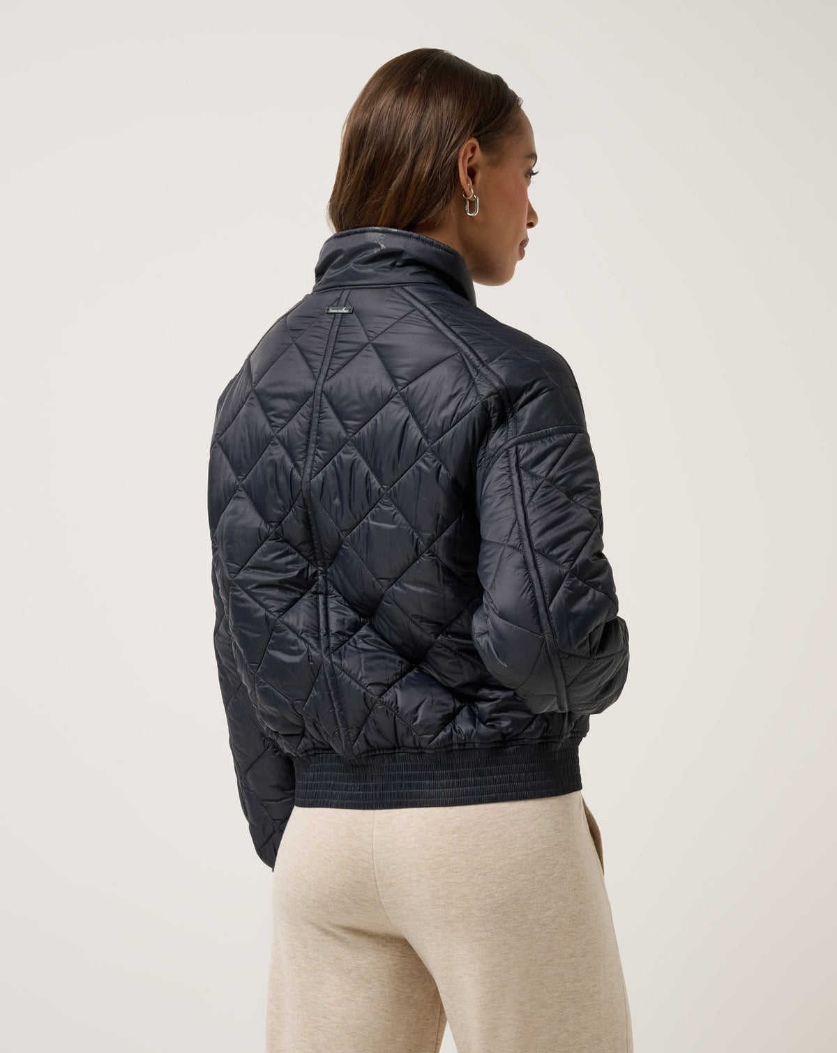 Lights At Night Quilted Jacket Obsidian | Travis Mathew Best Seller
